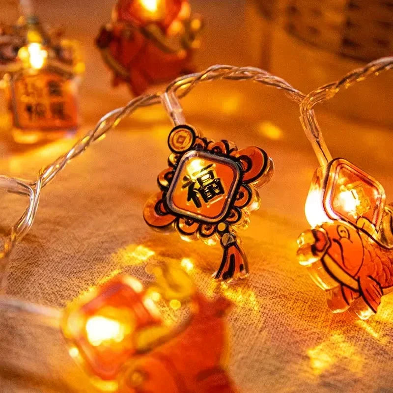 guirlande lumineuse chinoise festive lions poissons lanternes caractères rouges orange doré