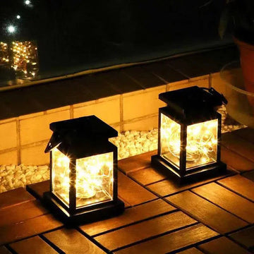 lanternes solaires noires transparentes modernes crochets métalliques extérieur decoration autonomes ip65 led