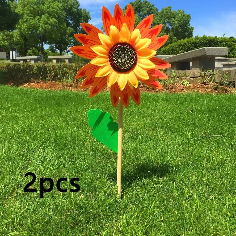 décoration extérieure fleur artificielle jaune rouge bleu vert rayonnante pétale verte tringle jardin cour