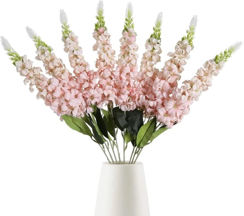 décoration intérieure bouquet artificiel moderne élégant vase livres bougies anniversaire mariage baby shower