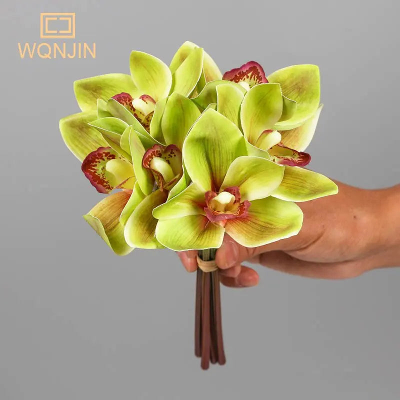 bouquet fleurs artificielles orchidée papillon moderne vert jaune blanc rose mariage décoration intérieure