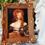 Cadre mural rococo doré avec photo de mariage