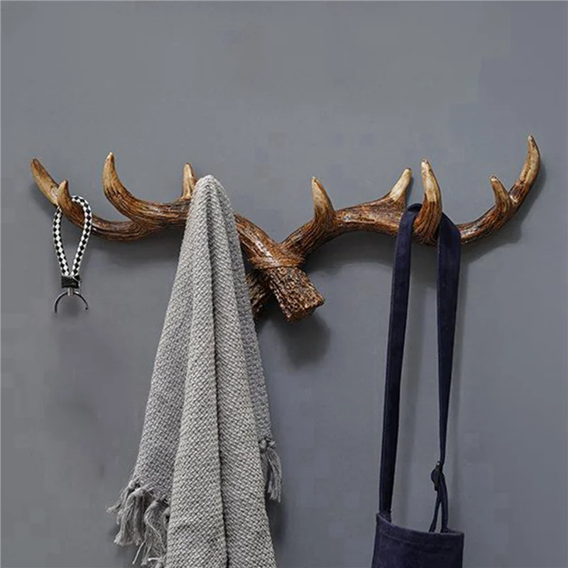 porte manteaux cornes cerf décoratif mur rustique texturé bois brut fixations murales éléments textiles