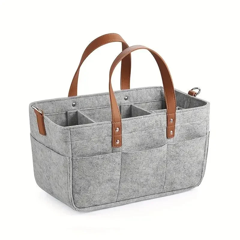 Détail des roulettes du sac à couches portable, facilitant le déplacement
