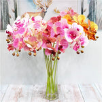 bouquet fleurs artificielles orchidées modernes orange rose blanc intérieur décoration maison anniversaire mariage