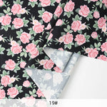 tissu mousseline polyester imprimé fleurs roses fond noir couture robe chemisier rideau diy