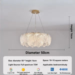 lampe suspendue moderne blanc doré coquillage translucide élégante anneaux métalliques lumière led chambre salon
