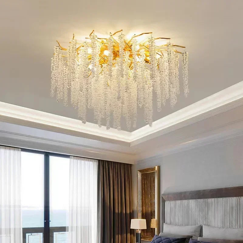 lustre moderne transparent branches goutte doré élégant illumination chambre salon