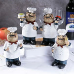 figurine cuisinier cartoon blanc gris rouge texture résinée brillante assiettes fruits spatule cuillère