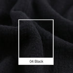 Une texture de tissu noir sombre et texturé remplit cette image.