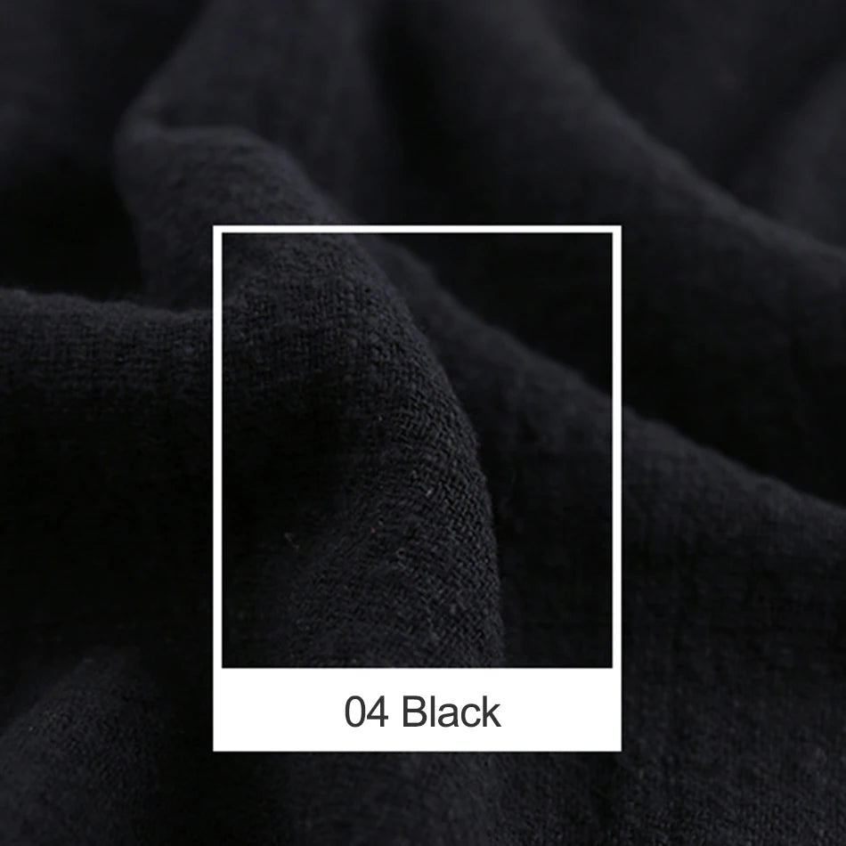 Une texture de tissu noir sombre et texturé remplit cette image.
