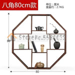 étagère murale bois sculpté classique marron statuettes théières vases tasses rangement cuisine déco