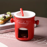 bouilloire chocolat céramique moderne cuillère bois bougie rouge noir blanc
