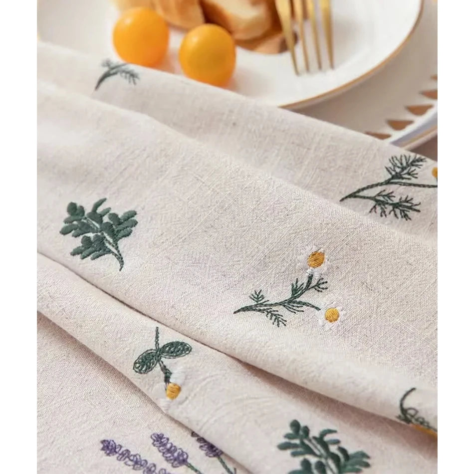 nappe coton brodée fleurs verte jaune violette rustique serviettes assorties tissage uni opaque salon