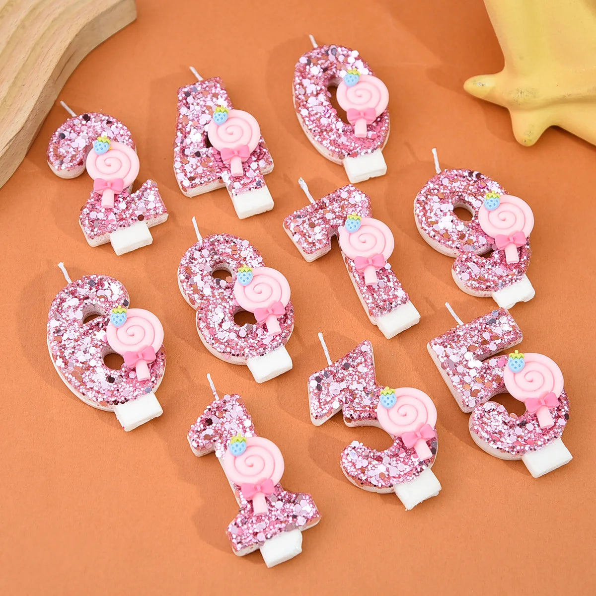 bougies numériques sucettes roses paillettes décoratives enfantine anniversaire fête tringle fixée chiffres bonbons rubans