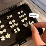 boîtes rangement boucles d'oreilles gris noires compartiments clips modernes étui présentation bijoux organiser porte