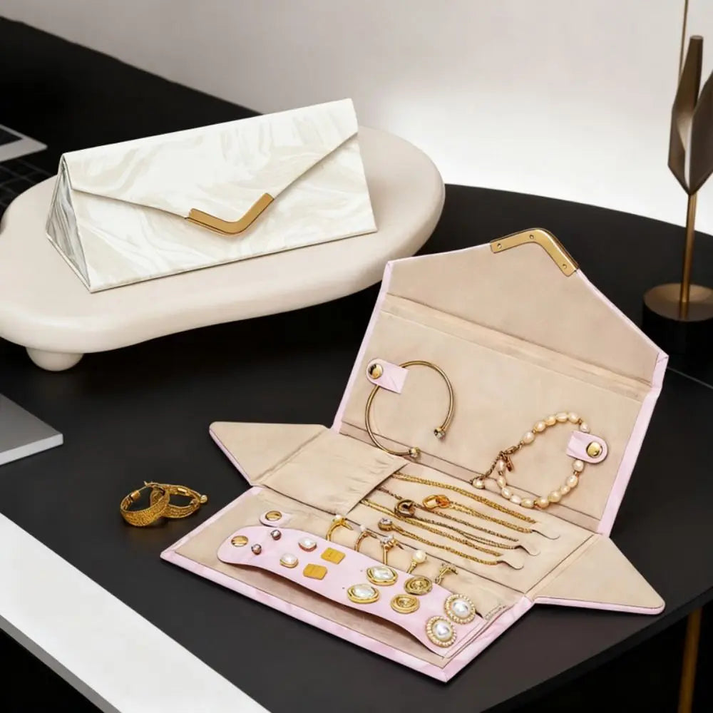 boîte bijoux pliable moderne élégante fermoir marbrée blanc rose pâle compartments organisation porte bijoux