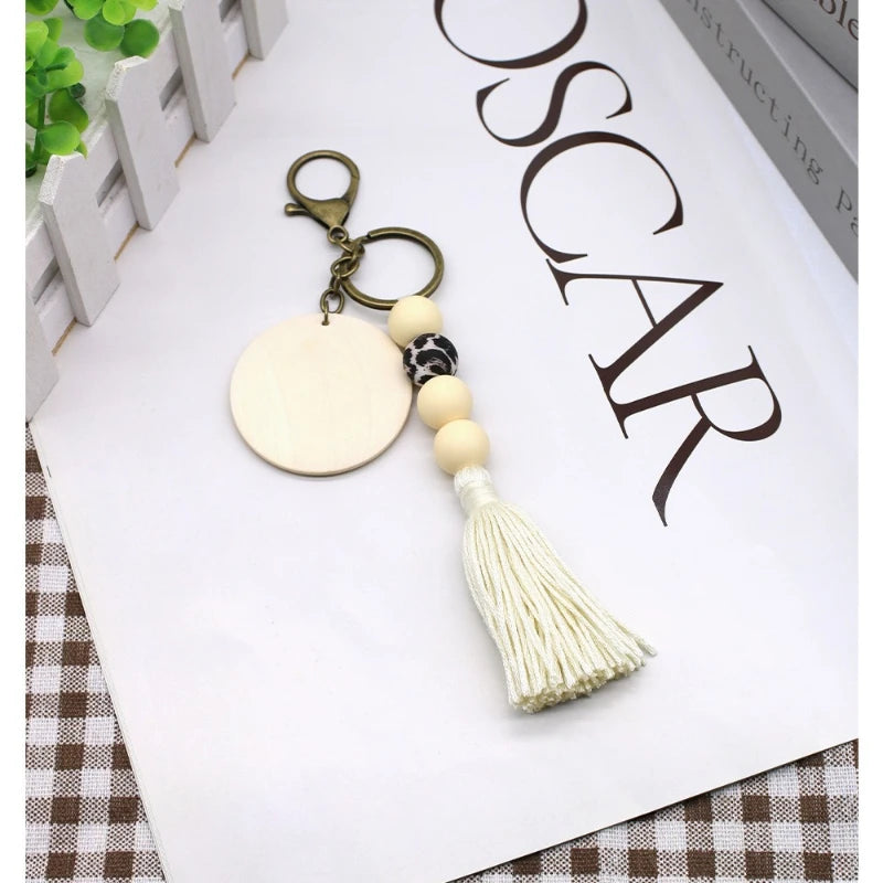 porte clés boho chic rondes frange bois blanc gris beige marronclair