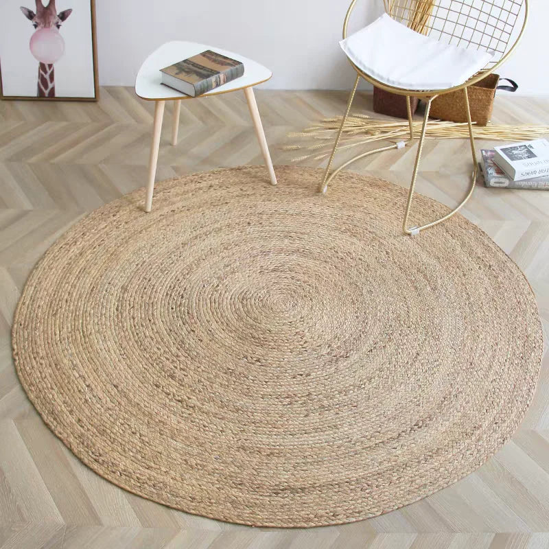 tapis rond tissé motifs concentriques couleur beige rustique naturel salon maisonhôtel