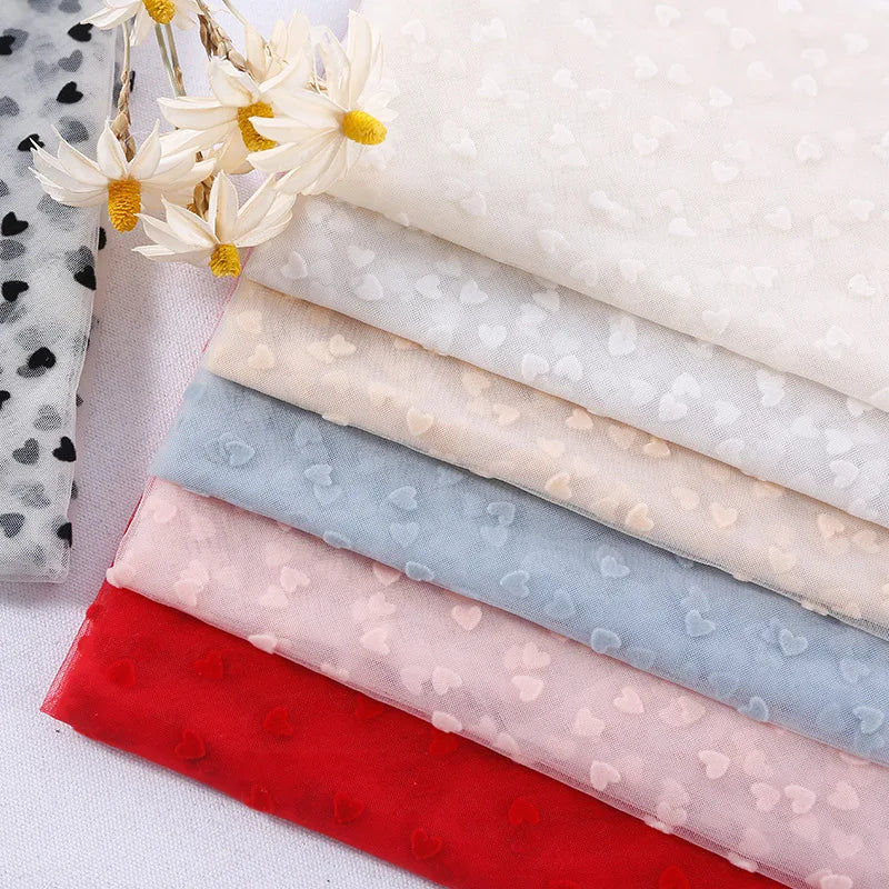 tissu polyester tulle guipure dentelle coeurs blancs transparent robe mariage délicate romantique 150cm rouge