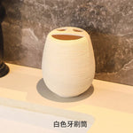 ensemble salle bain moderne tissage texture plateau savon brosse dents gobelet distributeur liquide beige