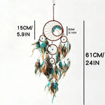 décoration murale attrape rêves boho chic plumes colorées textiles marron bleu gris