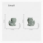 statues feng shui lions verts pierre granuleuse artisanat maison jardin
