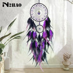 attrape rêves plumes violet noir rose traditionnel artisanal concentrique métal