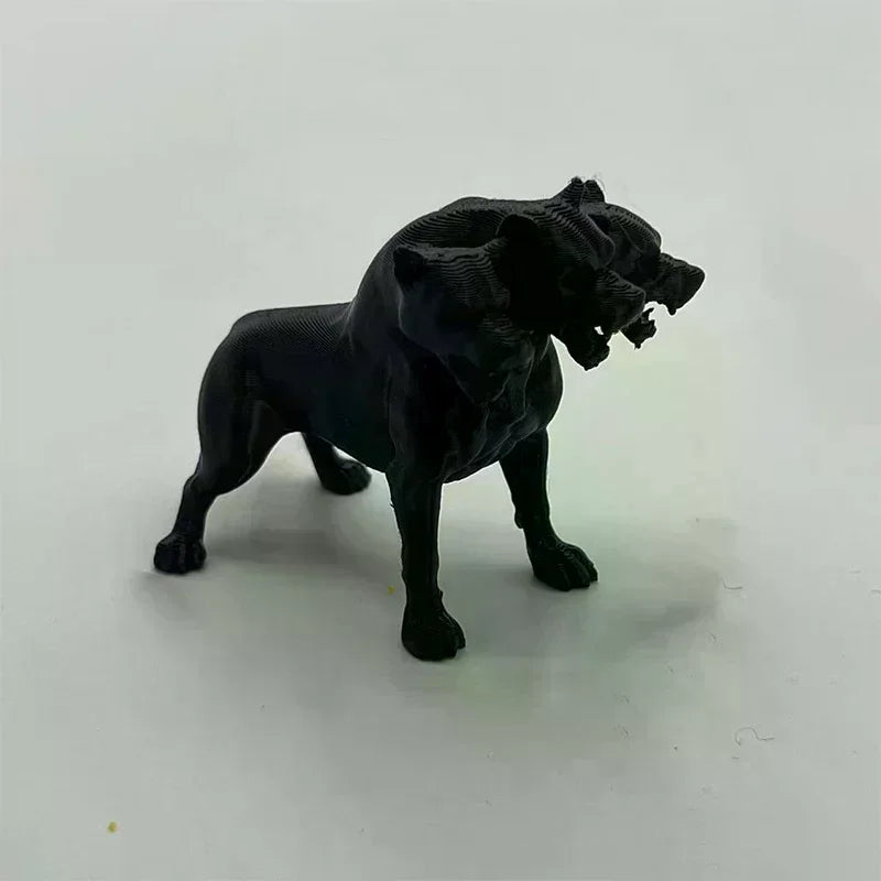 figurine chien trois têtes cerbère noire texture granuleuse mythologique fantastique