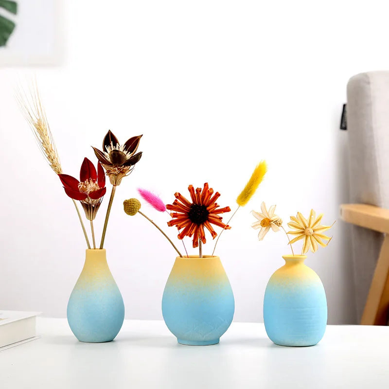 vases céramique moderne bleu jaune rose ombre douce fleurs sèches salon décoration table minimaliste