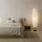 lampe pied moderne blanche japonais éclairage doux diffus papier texturé décoration intérieure chambre salon