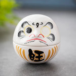 décoration table céramique daruma dolls visage stylisé motifs floraux traditionnel japonais couleur rose bleu