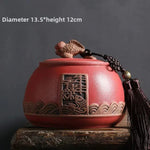 pot thé rouge jaune noir artisanal motifs floraux poisson chaîne pompon hermétique