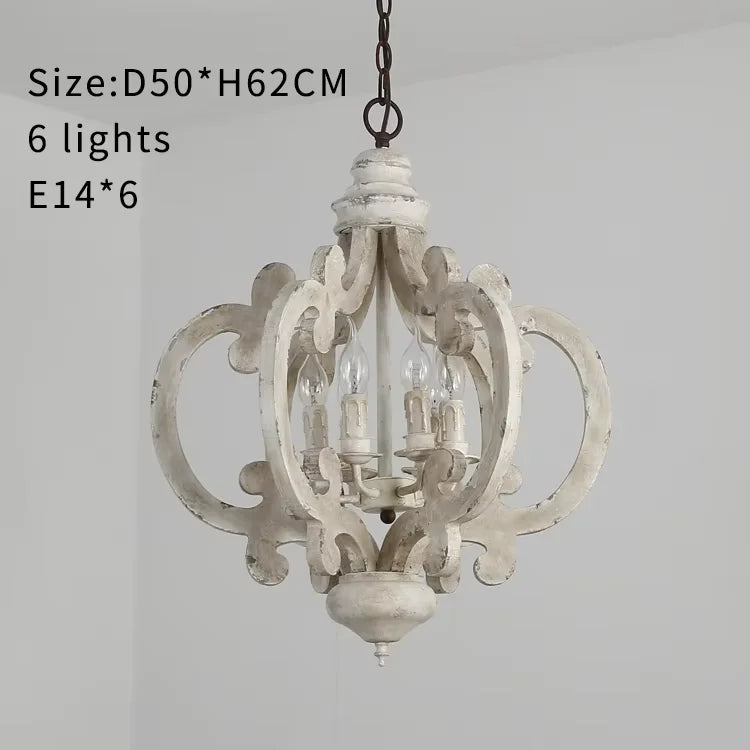 suspension lumineuse bois ornements sculptés finition rustique classique vintage blanc beige salle manger restaurant