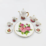 service thé miniature blanc bleu fleurs classique théière crème sucrier tasses assiettes