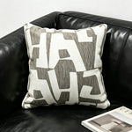 housse coussin géométrique moderne polyester coton noir blanc orange beige minimaliste contemporain ornemental 45x45cm