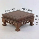 présentoir bois sculpté marron motifs complexes reliefs plantes bonsaï vases fleurs théière tasses déco