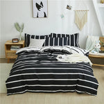 Housse de couette rayures noires et blanches sur lit