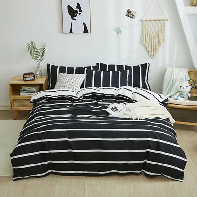 Housse de couette rayures noires et blanches sur lit