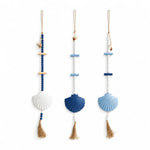 décoration murale bohème coquillages pompons blanc bleu marine chambre salon
