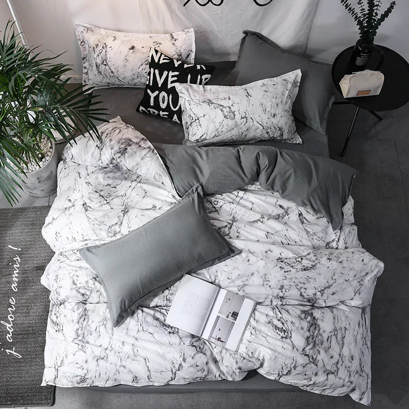 ensemble literie moderne motif marbré abstrait noir blanc pièces duvet taies d'oreiller