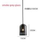 suspension lumineuse moderne transparente dorée ampoule câble noir minimaliste salle manger chambre