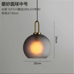 suspension lumineuse moderne gris fumé doré verre mat métal poli ampoule filament visible chambre