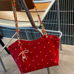 sac bandoulière toile rouge fleur blanche femme doux casual pince linge floral opacité