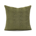coussin vert olive rayures moderne décoration intérieure blanc motif géométrique noir plissé