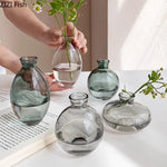 vases hydroponiques modernes transparents marron lisses décoration table plantes fleurs artificielles minimalistes
