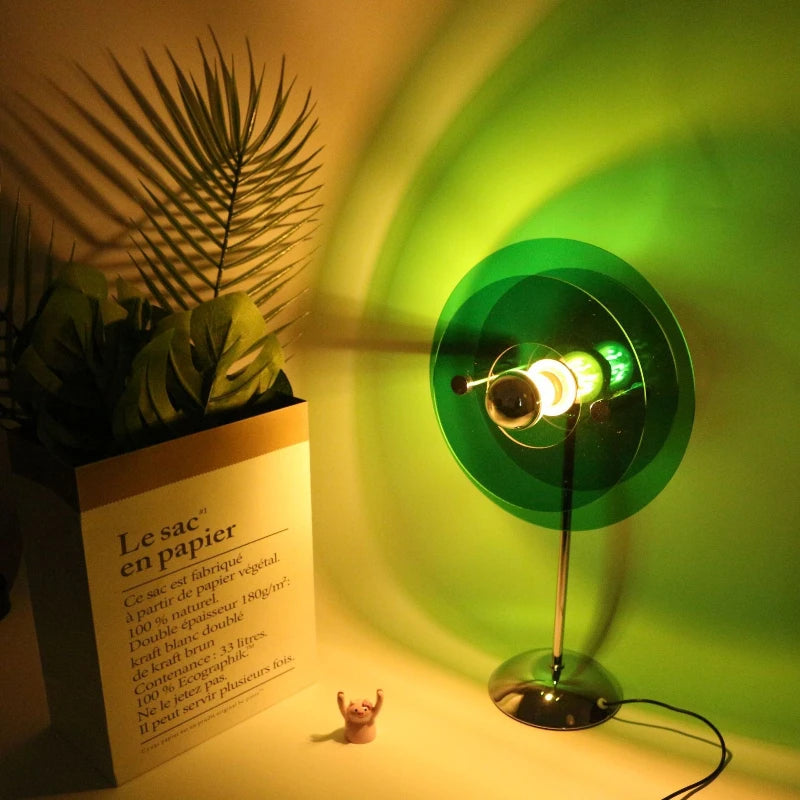 lampe table moderne transparente vert orange bleu pied chromé câble électrique minimalist LED