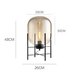 lampe sol moderne transparente ampoule filament noir gris fumé led verre minimaliste