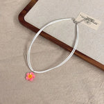 boucles doreilles tressées collier fleurs plumeria ensemble bijoux femmes moderne minimaliste blanc vert rose