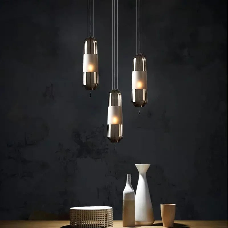 lampes suspendues modernes minimalistes gris fumé ambre transparent éclairage salon chambre étude